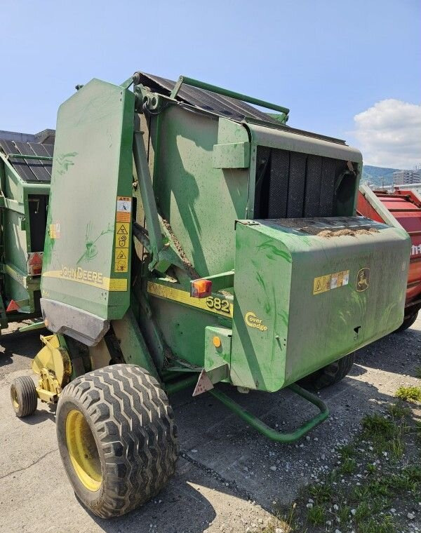 Пресс-подборщик John Deere 582 MaxiCut б/у - Пресс-подборщик рулонный: фото 4 Пресс-подборщик John Deere 582 MaxiCut б/у - Пресс-подборщик рулонный: фото 4
