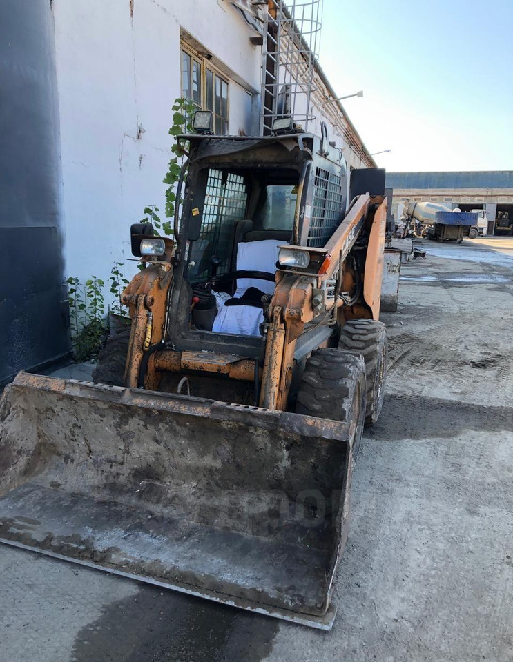 Case 440 - Мини-погрузчик (с бортовым поворотом): фото 1 Case 440 - Мини-погрузчик (с бортовым поворотом): фото 1