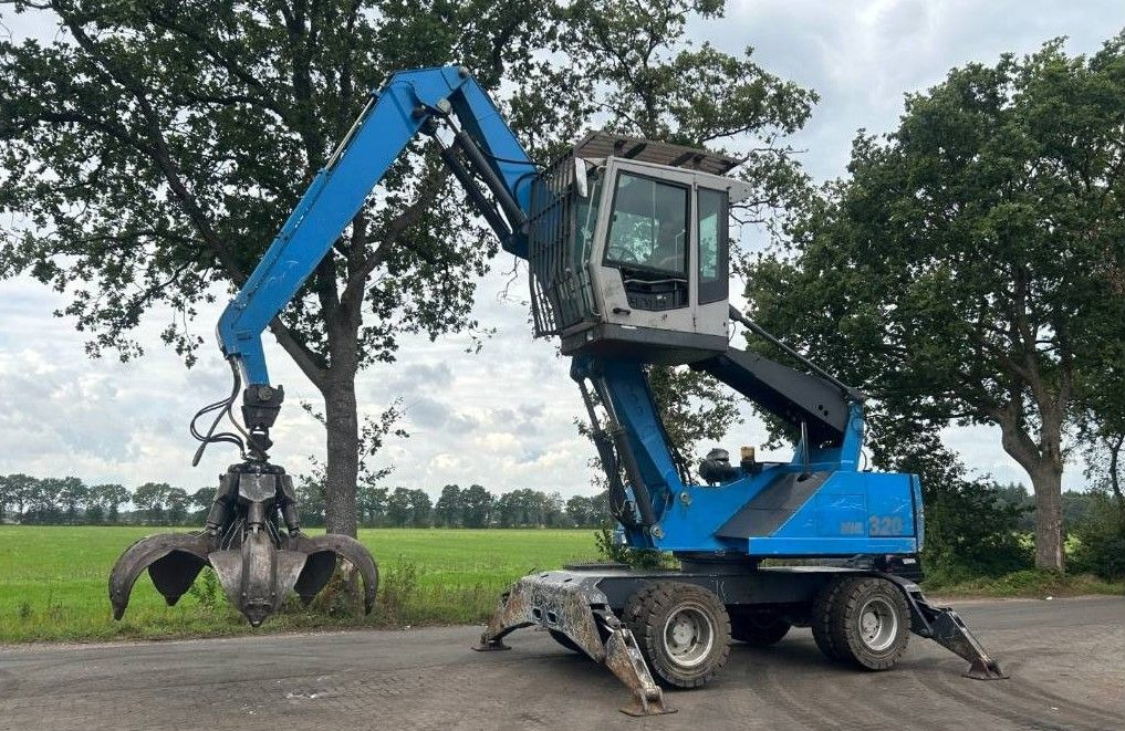 FUCHS MHL 320 - Экскаватор-перегружатель: фото 1 FUCHS MHL 320 - Экскаватор-перегружатель: фото 1