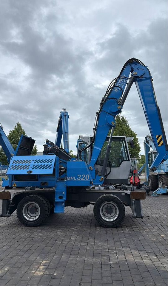 FUCHS MHL 320 - Экскаватор-перегружатель: фото 1 FUCHS MHL 320 - Экскаватор-перегружатель: фото 1