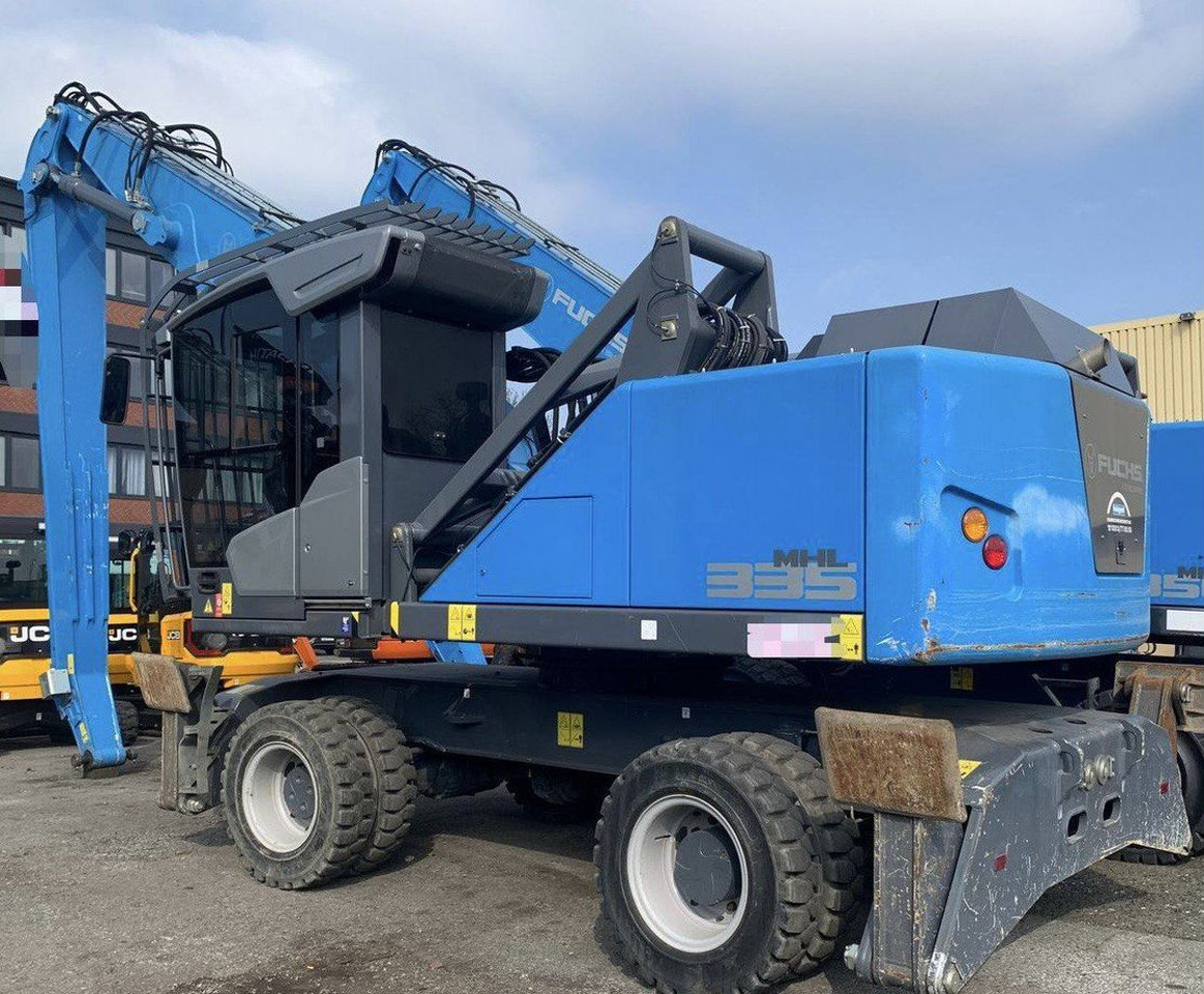 FUCHS MHL 335 - Экскаватор-перегружатель: фото 1 FUCHS MHL 335 - Экскаватор-перегружатель: фото 1