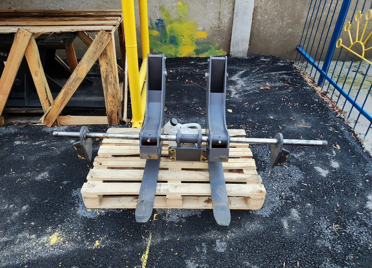 Паллетные вилы откидные нa экcкaватор-погрузчик - Вилы для Строительной техники: фото 2 Паллетные вилы откидные нa экcкaватор-погрузчик - Вилы для Строительной техники: фото 2