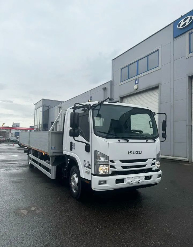 Isuzu ELF (N-series) - Малотоннажный бортовой грузовик: фото 1 Isuzu ELF (N-series) - Малотоннажный бортовой грузовик: фото 1