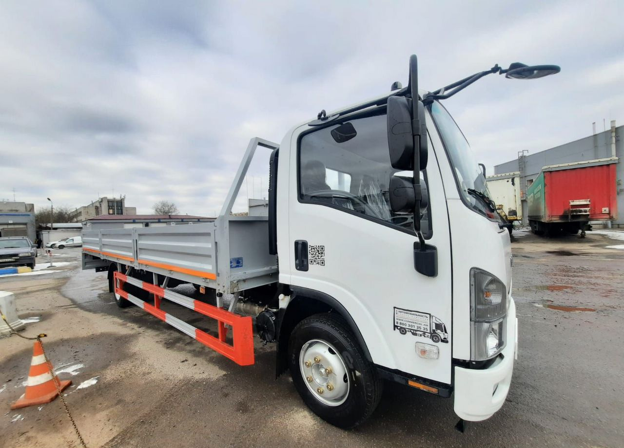 Isuzu Elf (N-series) - Бортовой грузовик/ Платформа: фото 2 Isuzu Elf (N-series) - Бортовой грузовик/ Платформа: фото 2