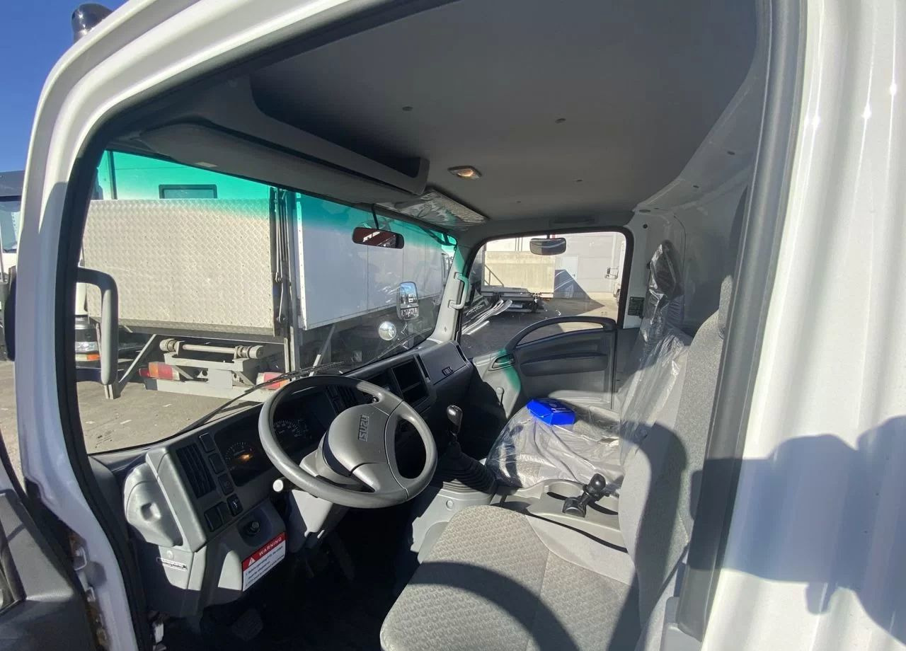 Isuzu Elf (N-series) - Бортовой грузовик/ Платформа, Автоманипулятор: фото 5 Isuzu Elf (N-series) - Бортовой грузовик/ Платформа, Автоманипулятор: фото 5