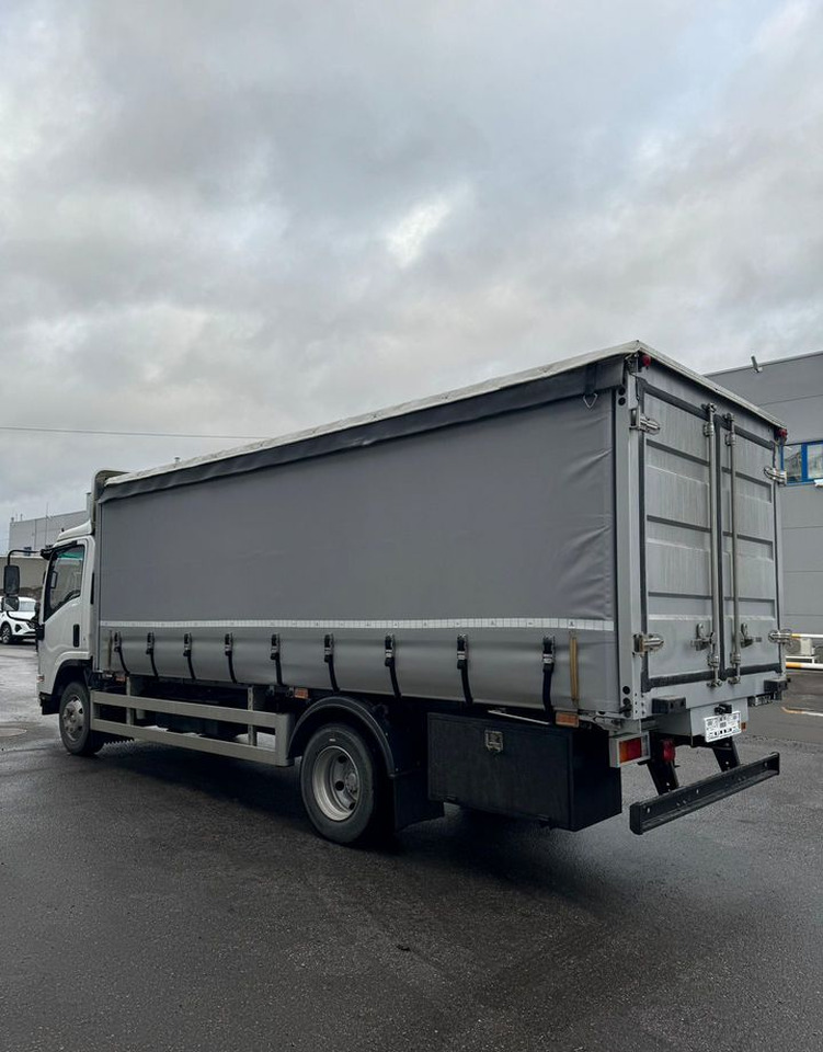 Isuzu Elf (N-series) - Тентованный грузовик: фото 5 Isuzu Elf (N-series) - Тентованный грузовик: фото 5