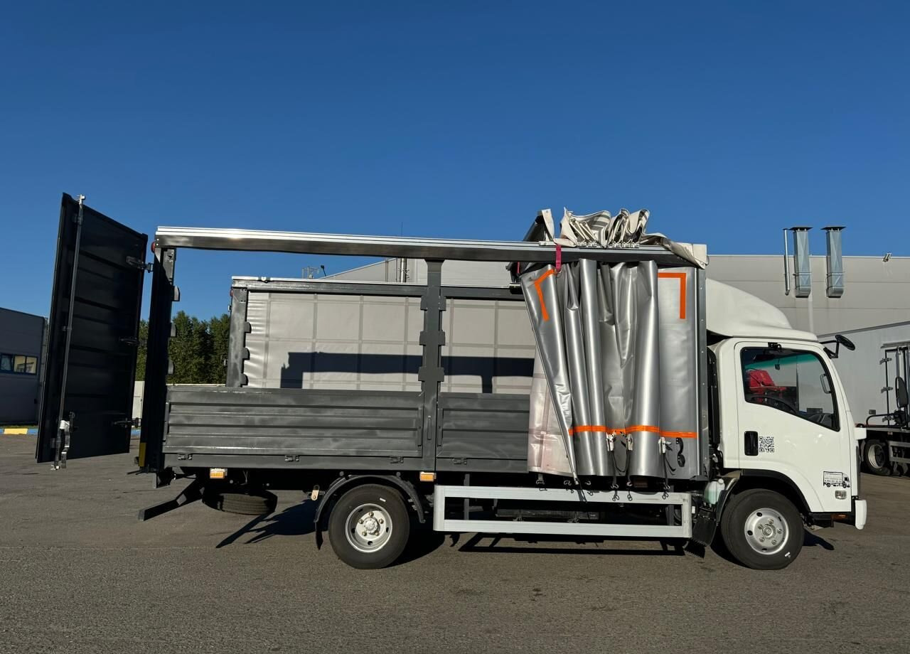 Новый Тентованный грузовик Isuzu Elf: фото 15 Новый Тентованный грузовик Isuzu Elf: фото 15