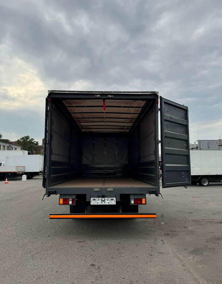 Новый Тентованный грузовик Isuzu Elf: фото 9 Новый Тентованный грузовик Isuzu Elf: фото 9