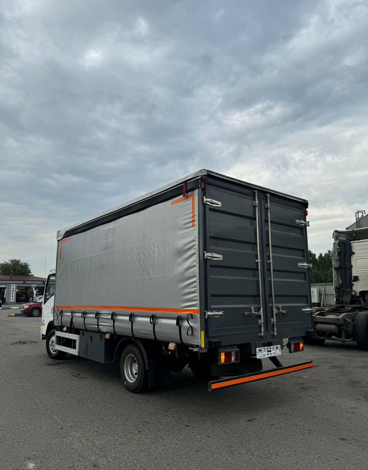 Isuzu Elf - Бортовой грузовик/ Платформа: фото 4 Isuzu Elf - Бортовой грузовик/ Платформа: фото 4
