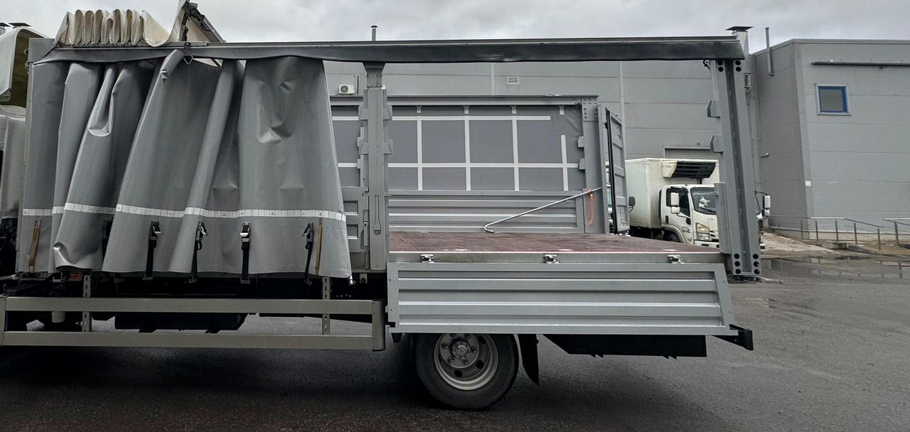 Новый Тентованный грузовик Isuzu Elf: фото 24