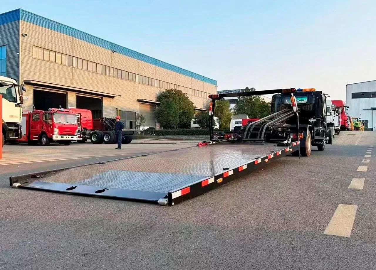 Isuzu Elf - Эвакуатор: фото 2 Isuzu Elf - Эвакуатор: фото 2