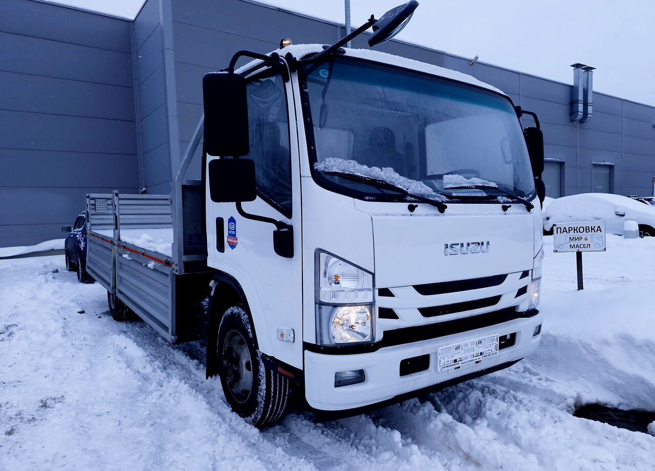Isuzu Elf - Бортовой грузовик/ Платформа: фото 1 Isuzu Elf - Бортовой грузовик/ Платформа: фото 1