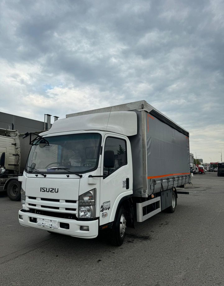 Isuzu Elf - Бортовой грузовик/ Платформа: фото 1 Isuzu Elf - Бортовой грузовик/ Платформа: фото 1