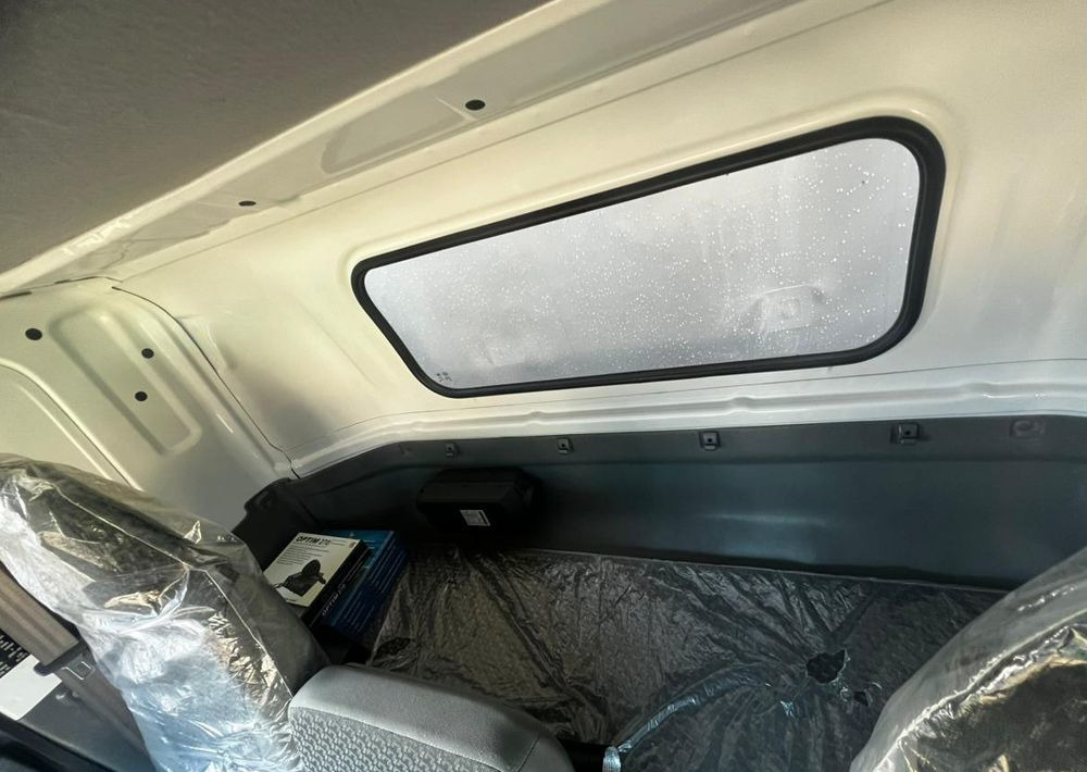 Isuzu Elf - Тентованный грузовик: фото 4 Isuzu Elf - Тентованный грузовик: фото 4