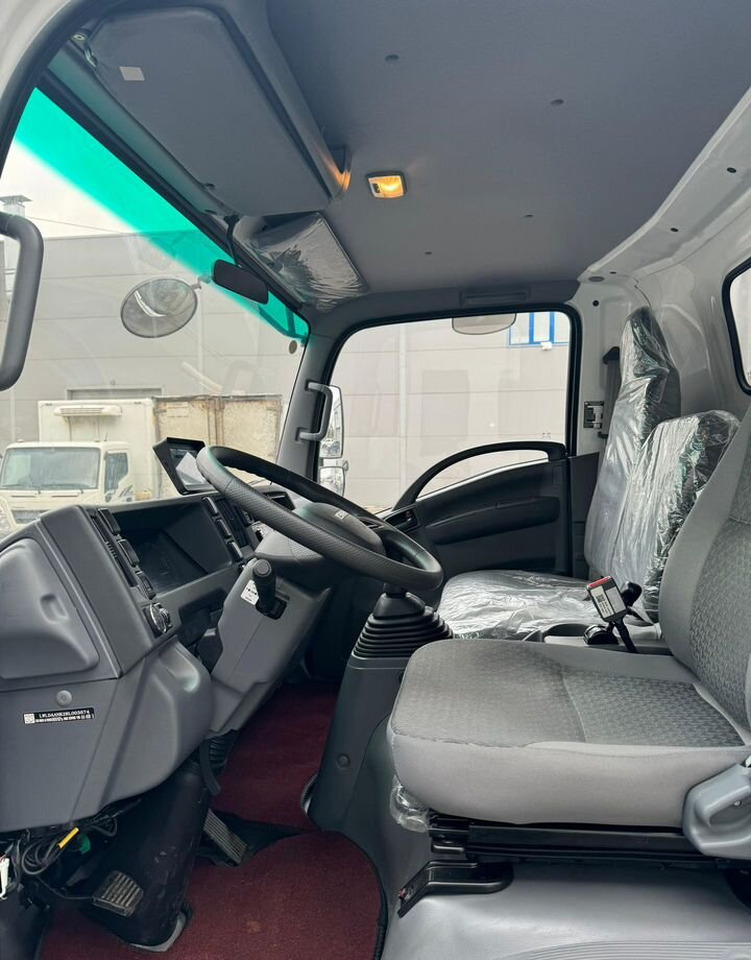 Новый Тентованный грузовик Isuzu Elf: фото 11