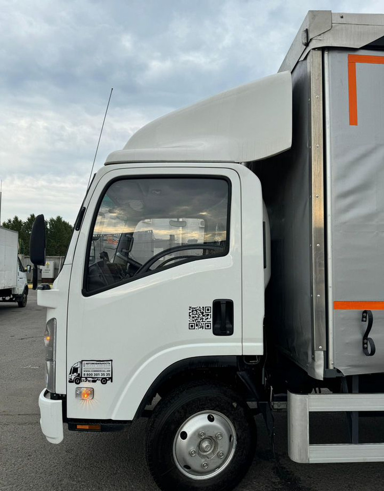 Новый Тентованный грузовик Isuzu Elf: фото 10 Новый Тентованный грузовик Isuzu Elf: фото 10