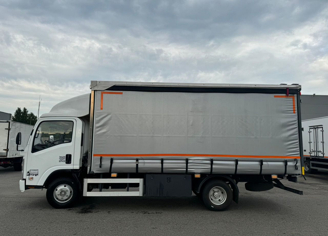 Isuzu Elf - Бортовой грузовик/ Платформа: фото 5 Isuzu Elf - Бортовой грузовик/ Платформа: фото 5