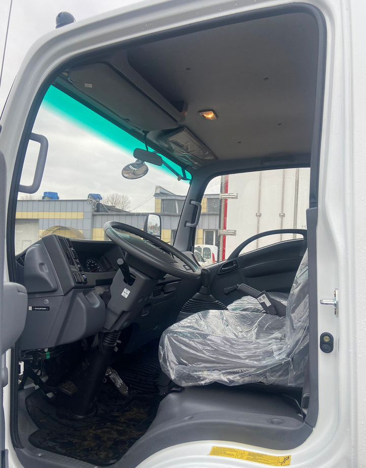 Isuzu Elf - Бортовой грузовик/ Платформа: фото 5 Isuzu Elf - Бортовой грузовик/ Платформа: фото 5