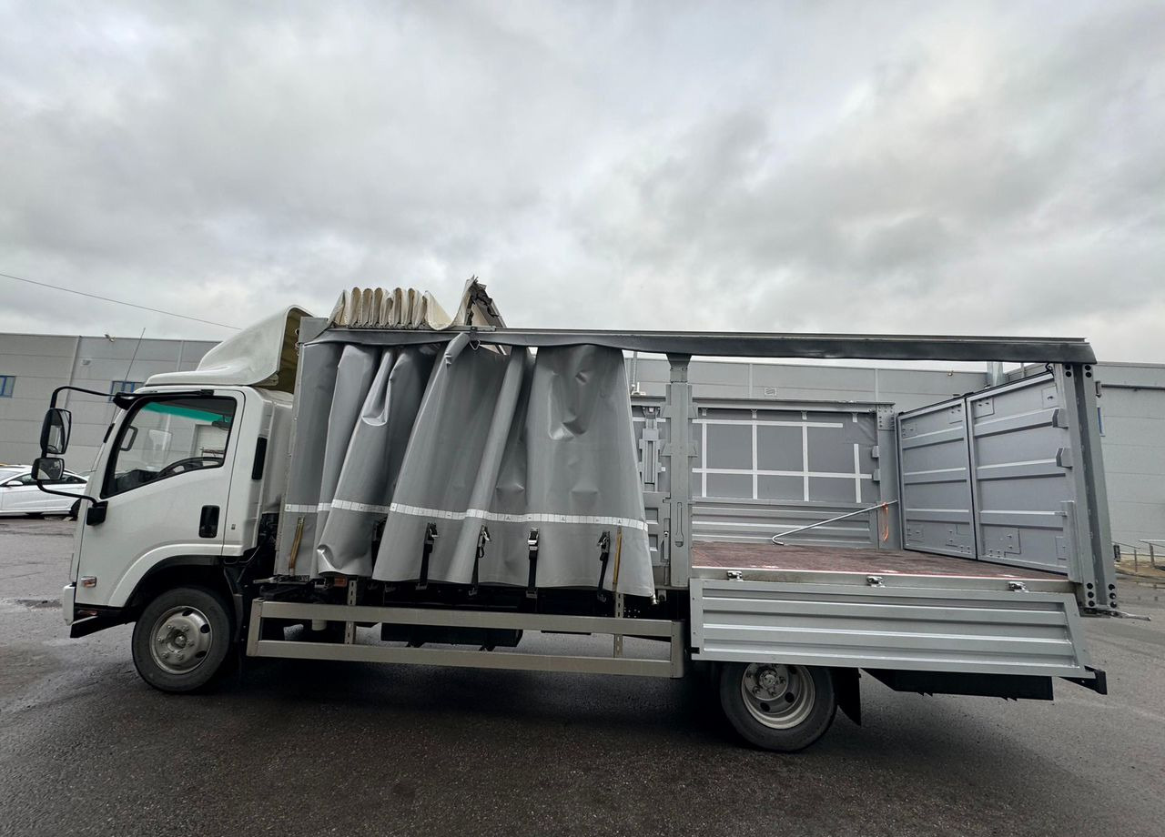Новый Тентованный грузовик Isuzu Elf: фото 21