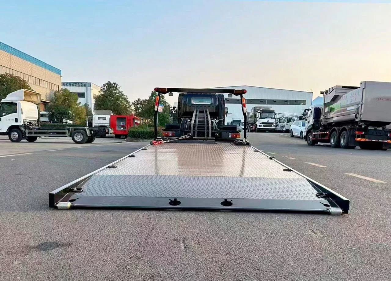 Isuzu Elf - Эвакуатор: фото 3 Isuzu Elf - Эвакуатор: фото 3