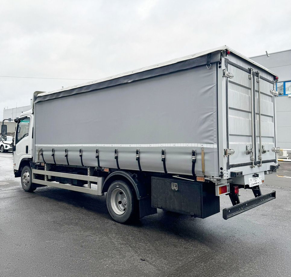 Isuzu Elf - Тентованный грузовик: фото 5 Isuzu Elf - Тентованный грузовик: фото 5