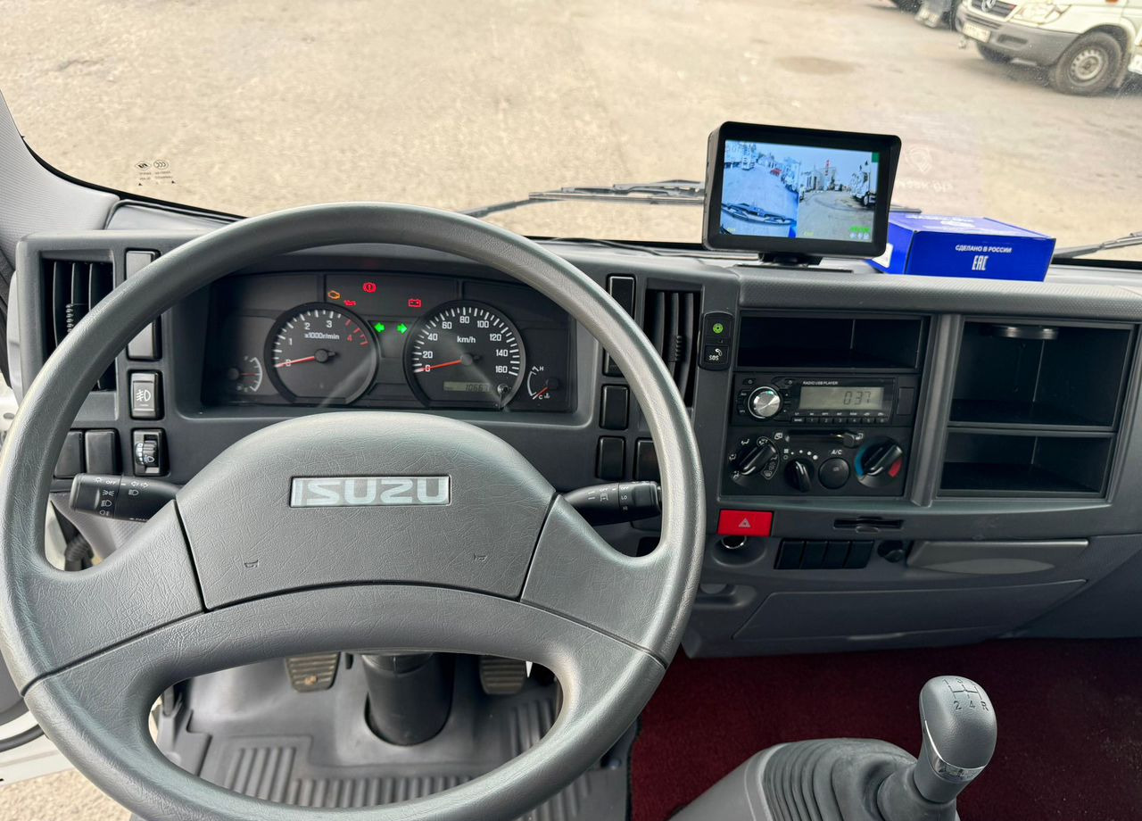 Новый Тентованный грузовик Isuzu Elf: фото 11 Новый Тентованный грузовик Isuzu Elf: фото 11