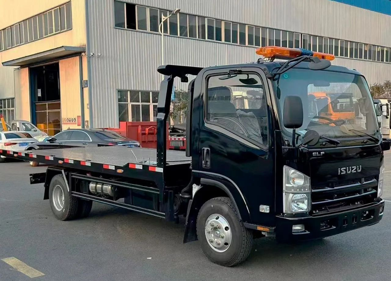 Isuzu Elf - Эвакуатор: фото 5 Isuzu Elf - Эвакуатор: фото 5