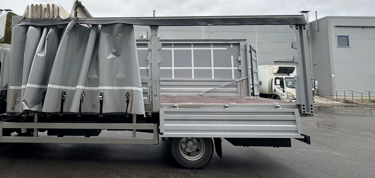 Новый Тентованный грузовик Isuzu Elf: фото 25