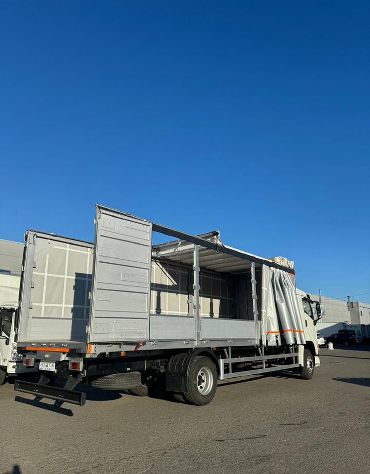 Новый Тентованный грузовик Isuzu Giga (C-series): фото 15 Новый Тентованный грузовик Isuzu Giga (C-series): фото 15