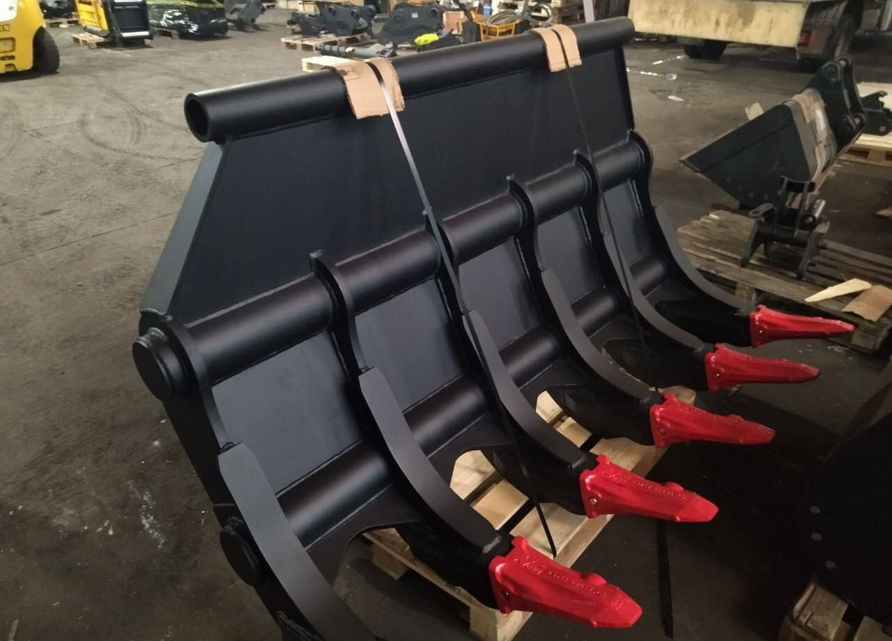 Корчеватель на фронтальный погрузчик - Рыхлитель: фото 1 Корчеватель на фронтальный погрузчик - Рыхлитель: фото 1