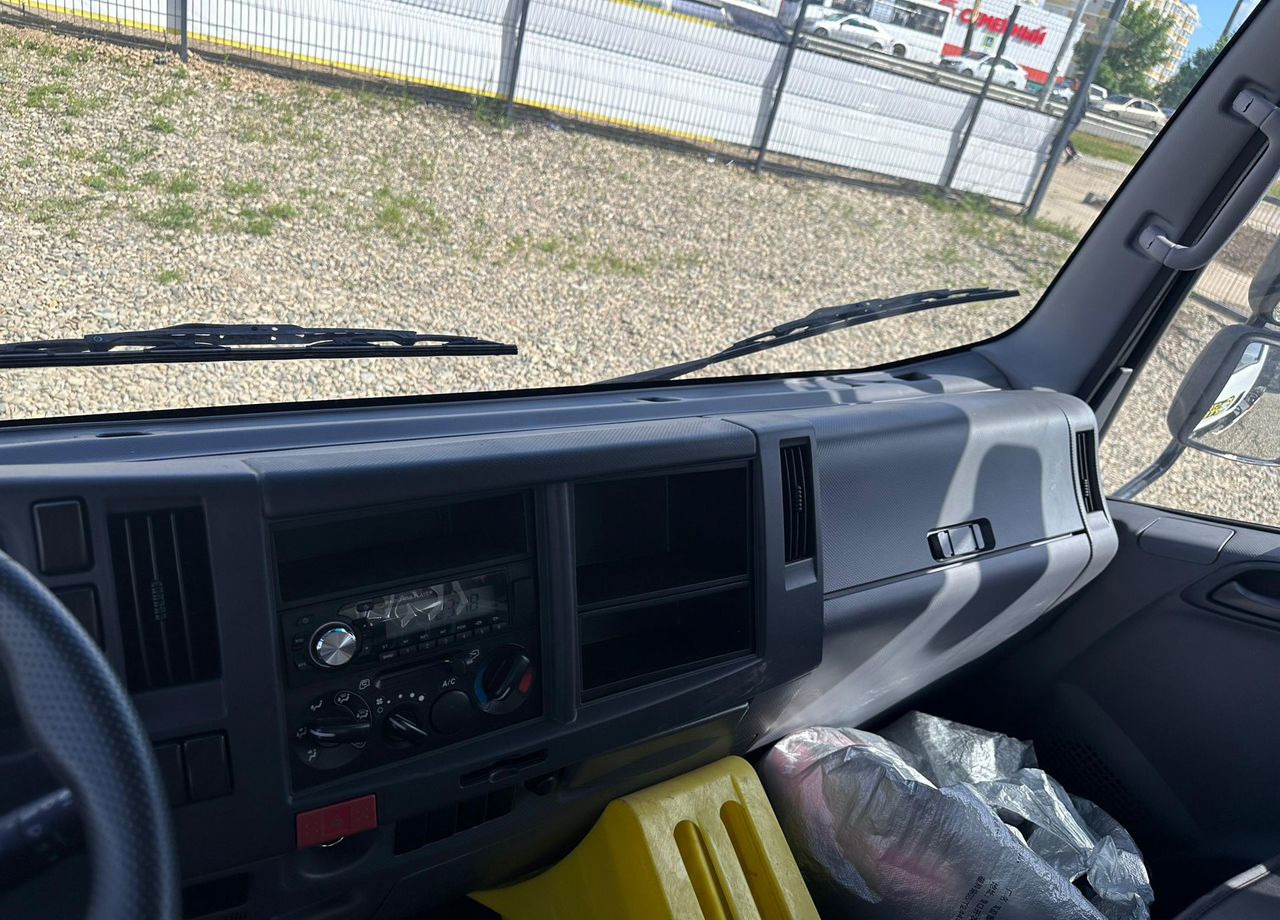 Новый Самосвал Isuzu Elf: фото 15 Новый Самосвал Isuzu Elf: фото 15