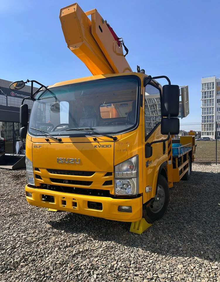 Isuzu Elf - Грузовик с подъемником: фото 4 Isuzu Elf - Грузовик с подъемником: фото 4