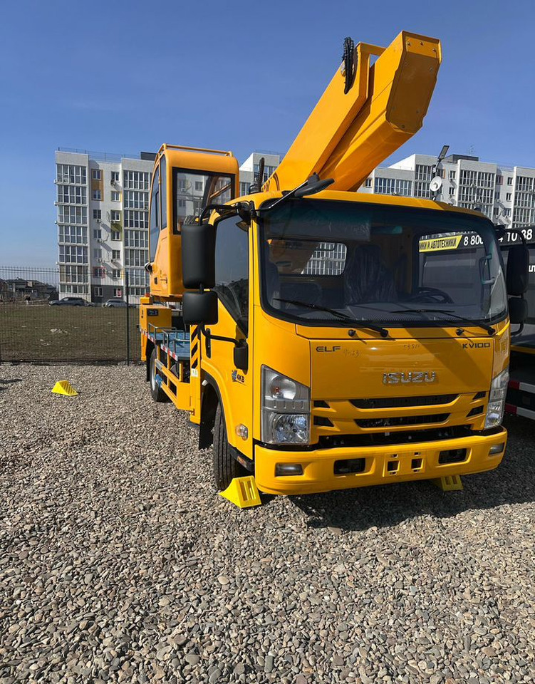 Isuzu Elf - Грузовик с подъемником: фото 2 Isuzu Elf - Грузовик с подъемником: фото 2