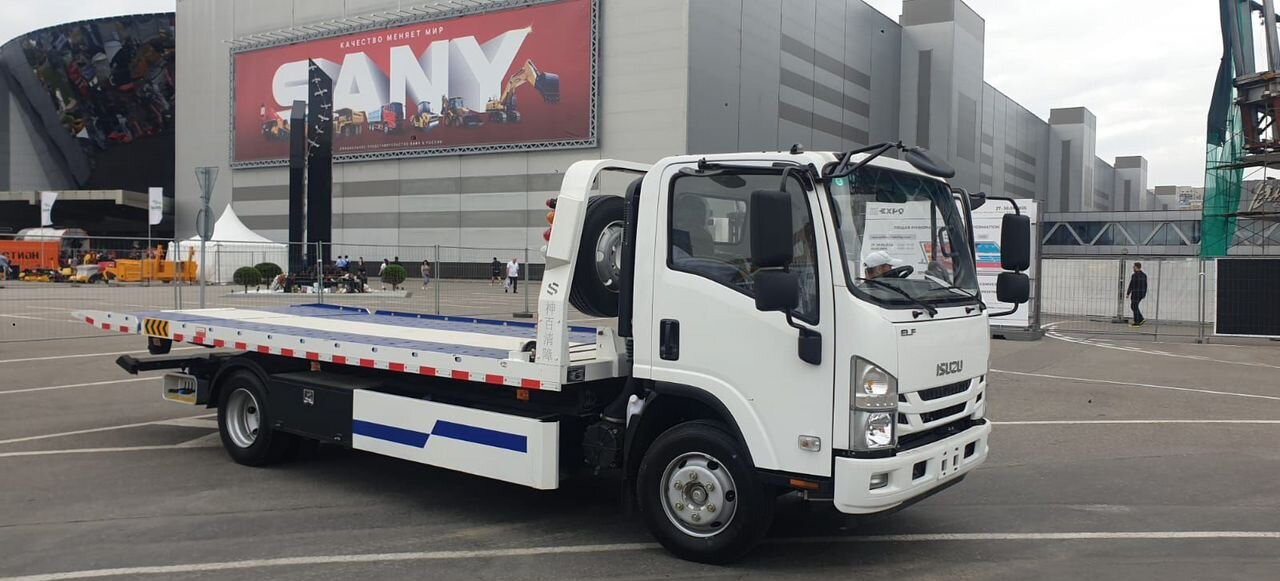 Isuzu ELF (N-series) - Эвакуатор: фото 1 Isuzu ELF (N-series) - Эвакуатор: фото 1