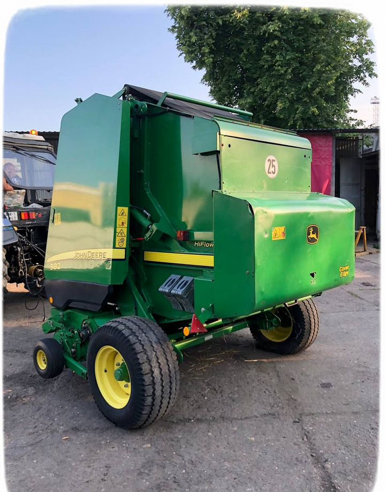 John Deere 582 - Пресс-подборщик рулонный: фото 1 John Deere 582 - Пресс-подборщик рулонный: фото 1