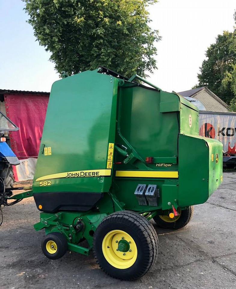 John Deere 582 - Пресс-подборщик рулонный: фото 1 John Deere 582 - Пресс-подборщик рулонный: фото 1