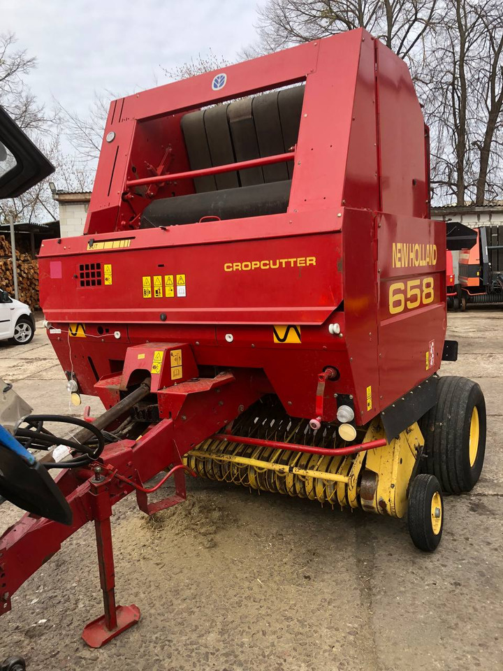 NEW HOLLAND 658 - Пресс-подборщик рулонный: фото 1 NEW HOLLAND 658 - Пресс-подборщик рулонный: фото 1