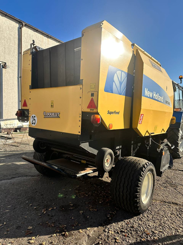 NEW HOLLAND 740A - Пресс-подборщик рулонный: фото 4 NEW HOLLAND 740A - Пресс-подборщик рулонный: фото 4