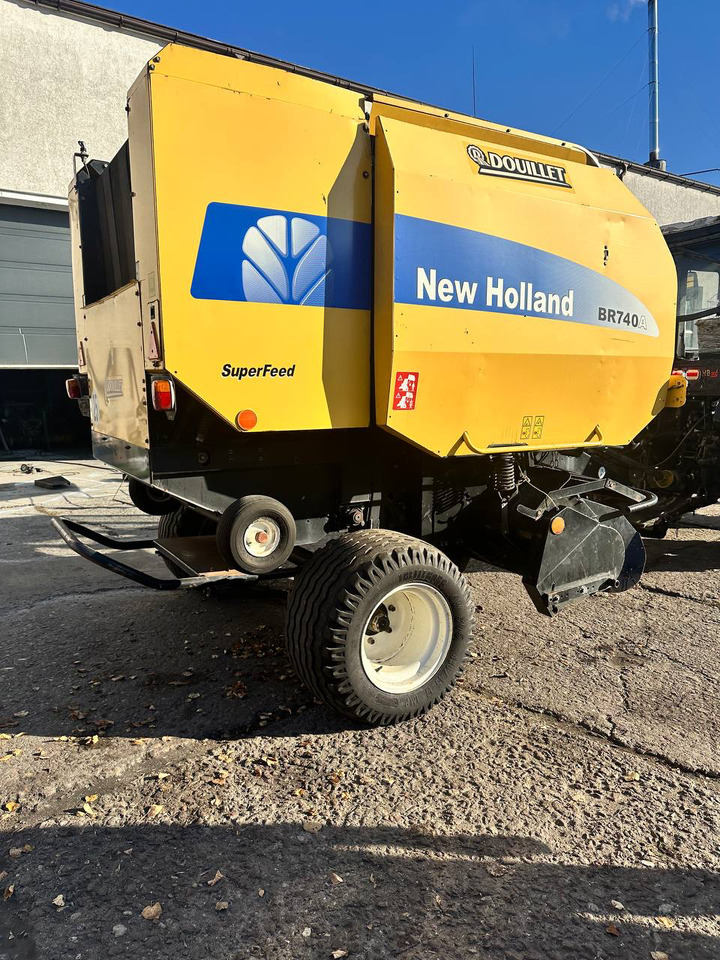 NEW HOLLAND 740A - Пресс-подборщик рулонный: фото 1 NEW HOLLAND 740A - Пресс-подборщик рулонный: фото 1