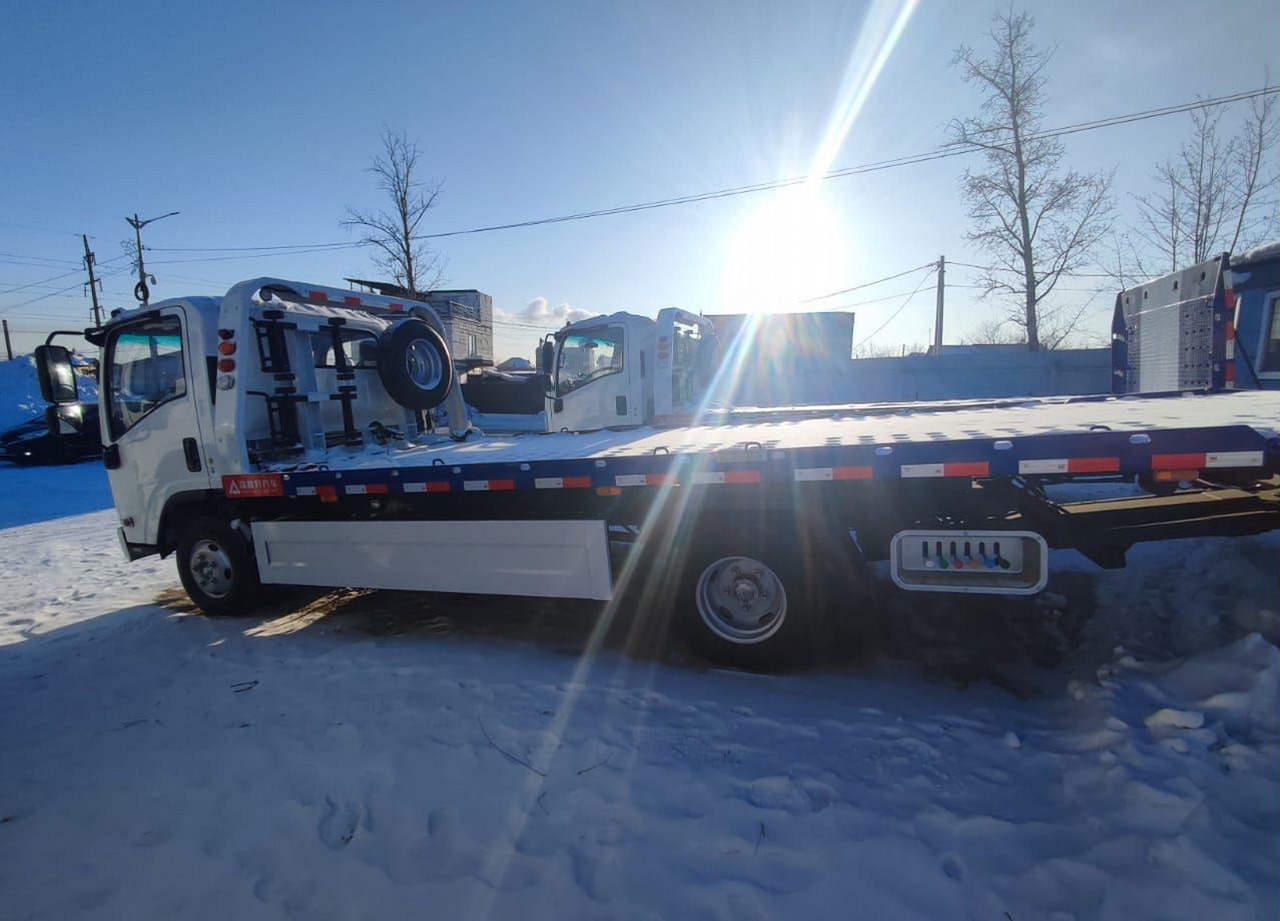 Isuzu Elf - Эвакуатор: фото 4 Isuzu Elf - Эвакуатор: фото 4