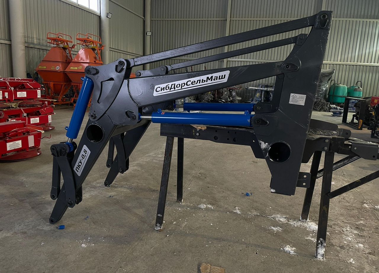 СибДорСельМаш ПКУ-0,8 - Фронтальный погрузчик для трактора: фото 1 СибДорСельМаш ПКУ-0,8 - Фронтальный погрузчик для трактора: фото 1