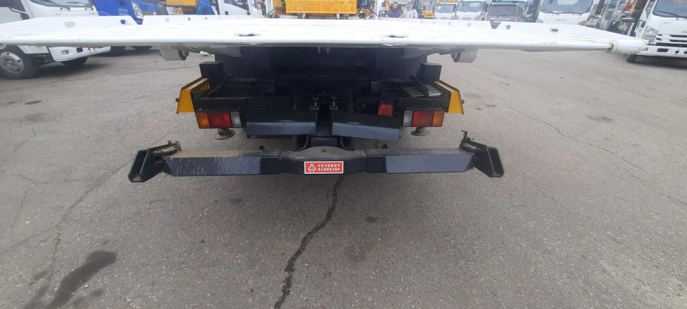 ISUZU Эвакуатор на шасси ISUZU 4x4 дв 139kw кабина со спальником, КМУ XCMG SQS125-4 гп 5т, сдвижная платформа, лебедка, корзина, задние аутригеры, бриль, радиостанция, сигнальный маяк на крыше кабины. - Эвакуатор: фото 4 ISUZU Эвакуатор на шасси ISUZU 4x4 дв 139kw кабина со спальником, КМУ XCMG SQS125-4 гп 5т, сдвижная платформа, лебедка, корзина, задние аутригеры, бриль, радиостанция, сигнальный маяк на крыше кабины. - Эвакуатор: фото 4
