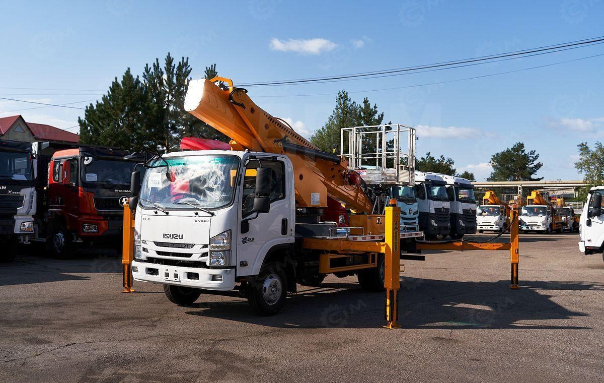 Isuzu Elf - Грузовик с подъемником: фото 4 Isuzu Elf - Грузовик с подъемником: фото 4