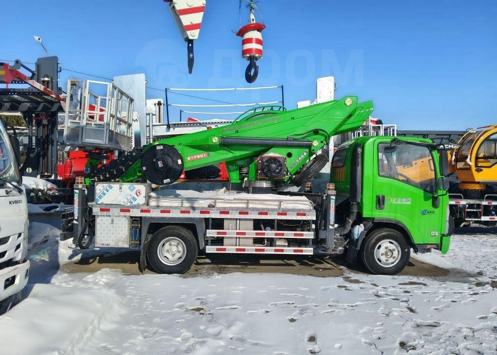 Isuzu KV100P - Грузовик с подъемником: фото 1 Isuzu KV100P - Грузовик с подъемником: фото 1