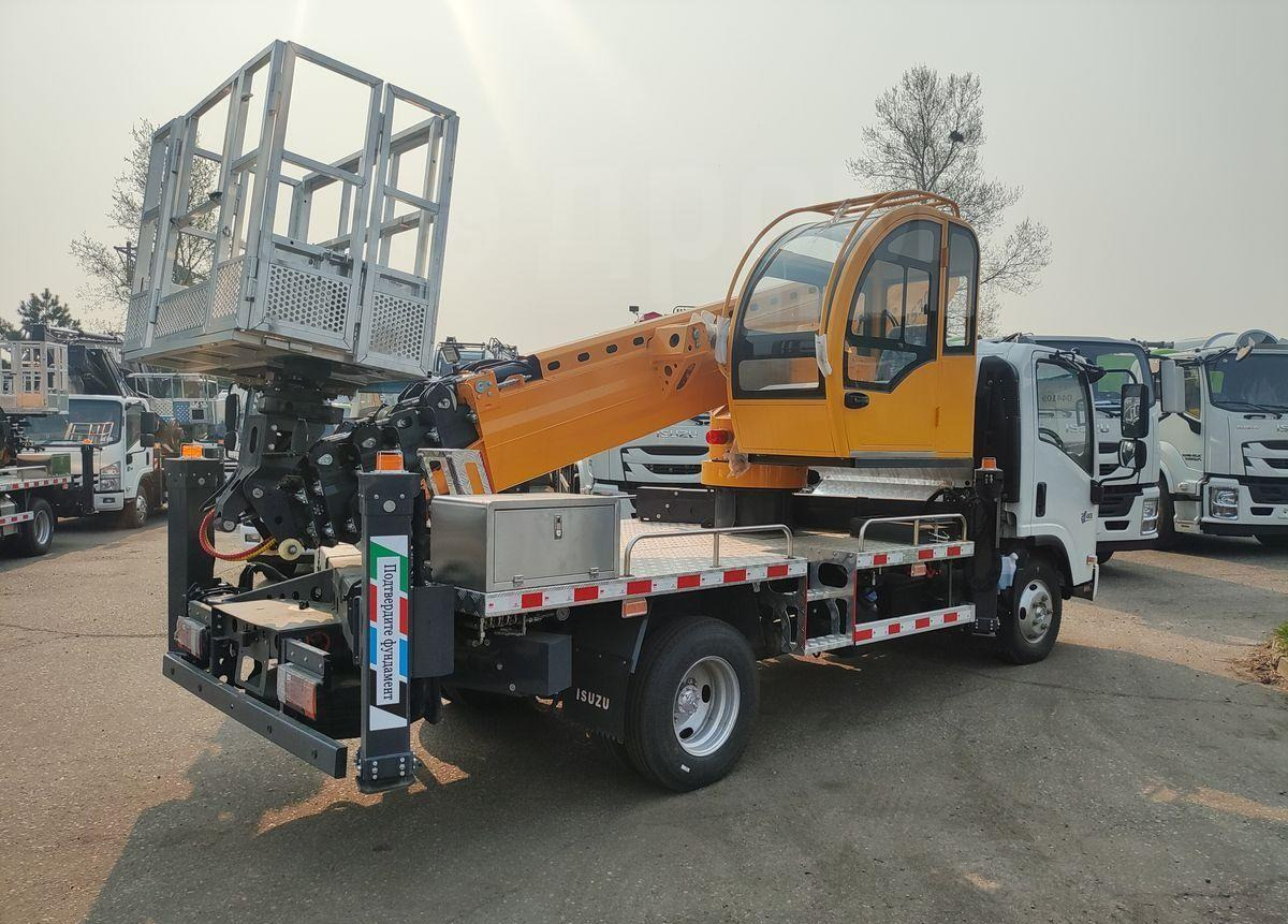 Isuzu Elf - Грузовик с подъемником: фото 3 Isuzu Elf - Грузовик с подъемником: фото 3