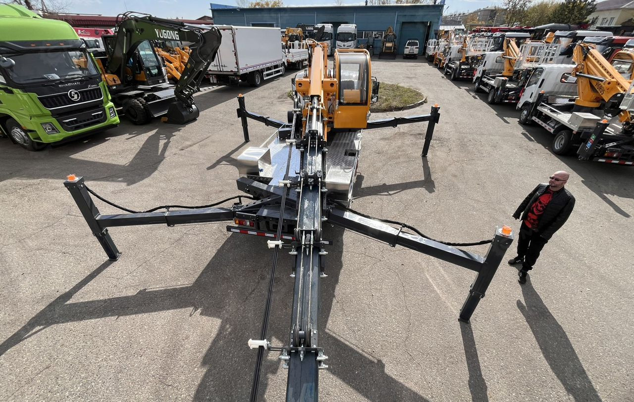 Isuzu Elf - Грузовик с подъемником: фото 3 Isuzu Elf - Грузовик с подъемником: фото 3