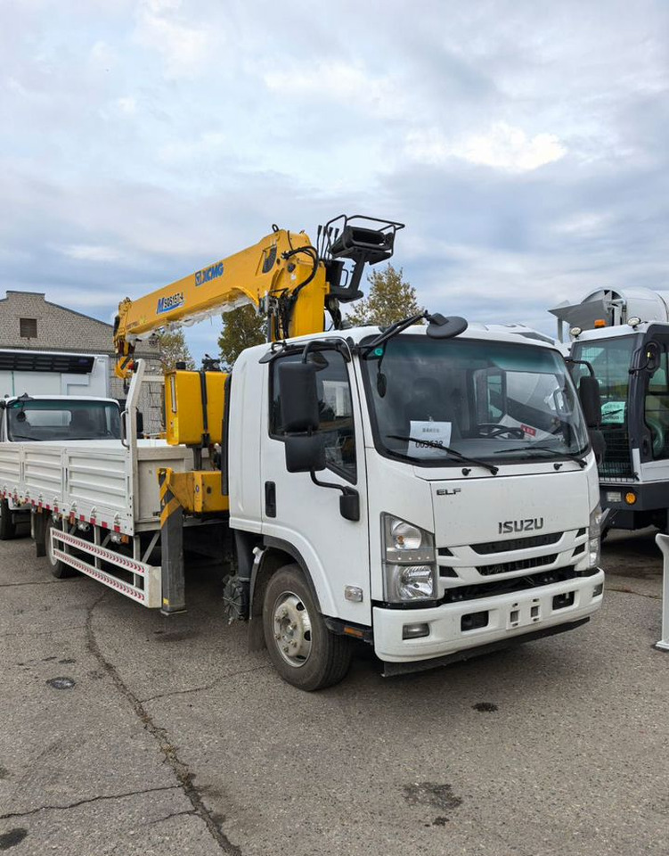 Isuzu Elf (N-series) - Грузовик бортовой/ Платформа, Автоманипулятор: фото 1 Isuzu Elf (N-series) - Грузовик бортовой/ Платформа, Автоманипулятор: фото 1