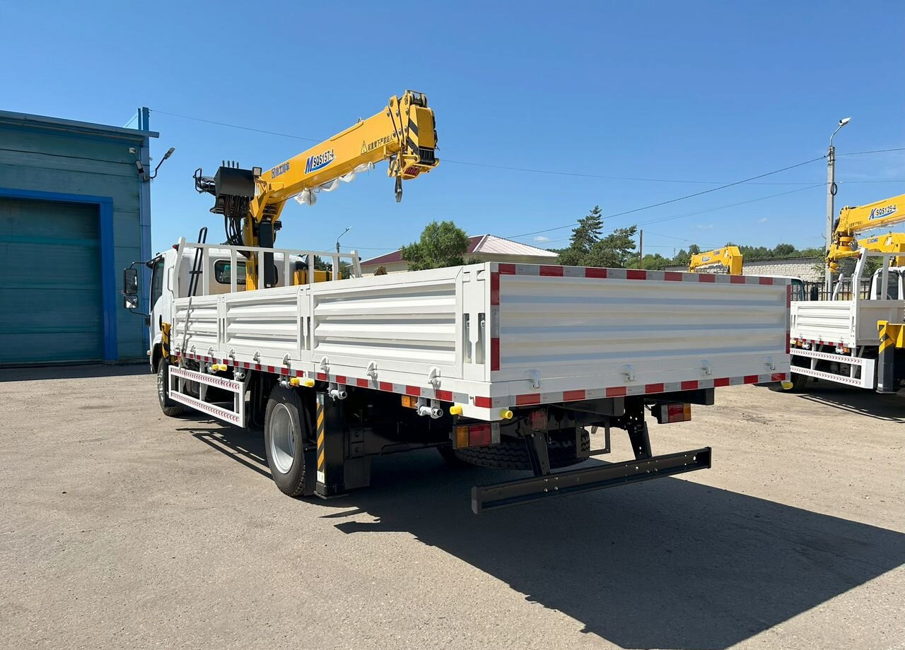 Isuzu Elf (N-series) - Грузовик бортовой/ Платформа, Автоманипулятор: фото 4 Isuzu Elf (N-series) - Грузовик бортовой/ Платформа, Автоманипулятор: фото 4