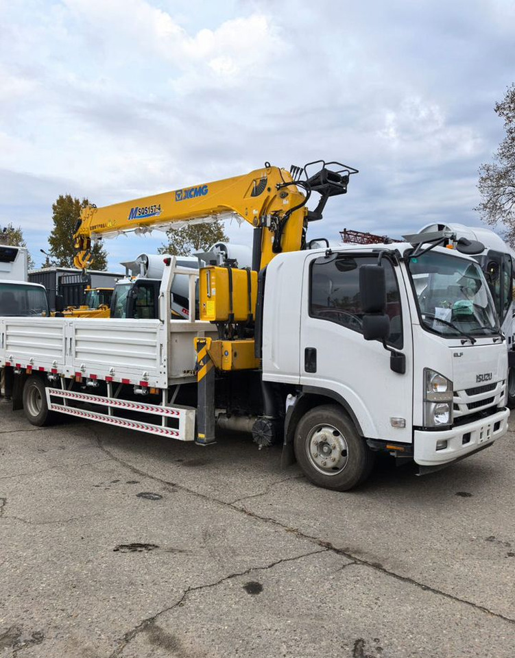 Isuzu Elf (N-series) - Грузовик бортовой/ Платформа, Автоманипулятор: фото 4 Isuzu Elf (N-series) - Грузовик бортовой/ Платформа, Автоманипулятор: фото 4