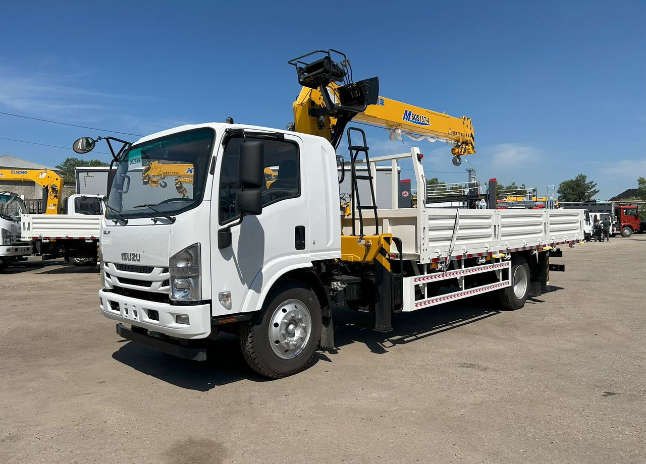 Isuzu Elf (N-series) - Грузовик бортовой/ Платформа, Автоманипулятор: фото 1 Isuzu Elf (N-series) - Грузовик бортовой/ Платформа, Автоманипулятор: фото 1